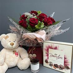 12 Rose, bear, candle and chocolates 