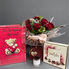 Roses, candle, card and chocolates 