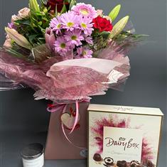 Perfect -flowers, candle and chocolates